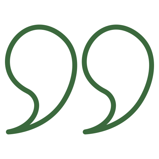 Green double closing quotation marks on a white background.