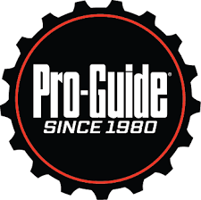 A black circular logo with a red outline features the text Pro-Guide in large white letters and SINCE 1980 below it in smaller white letters.